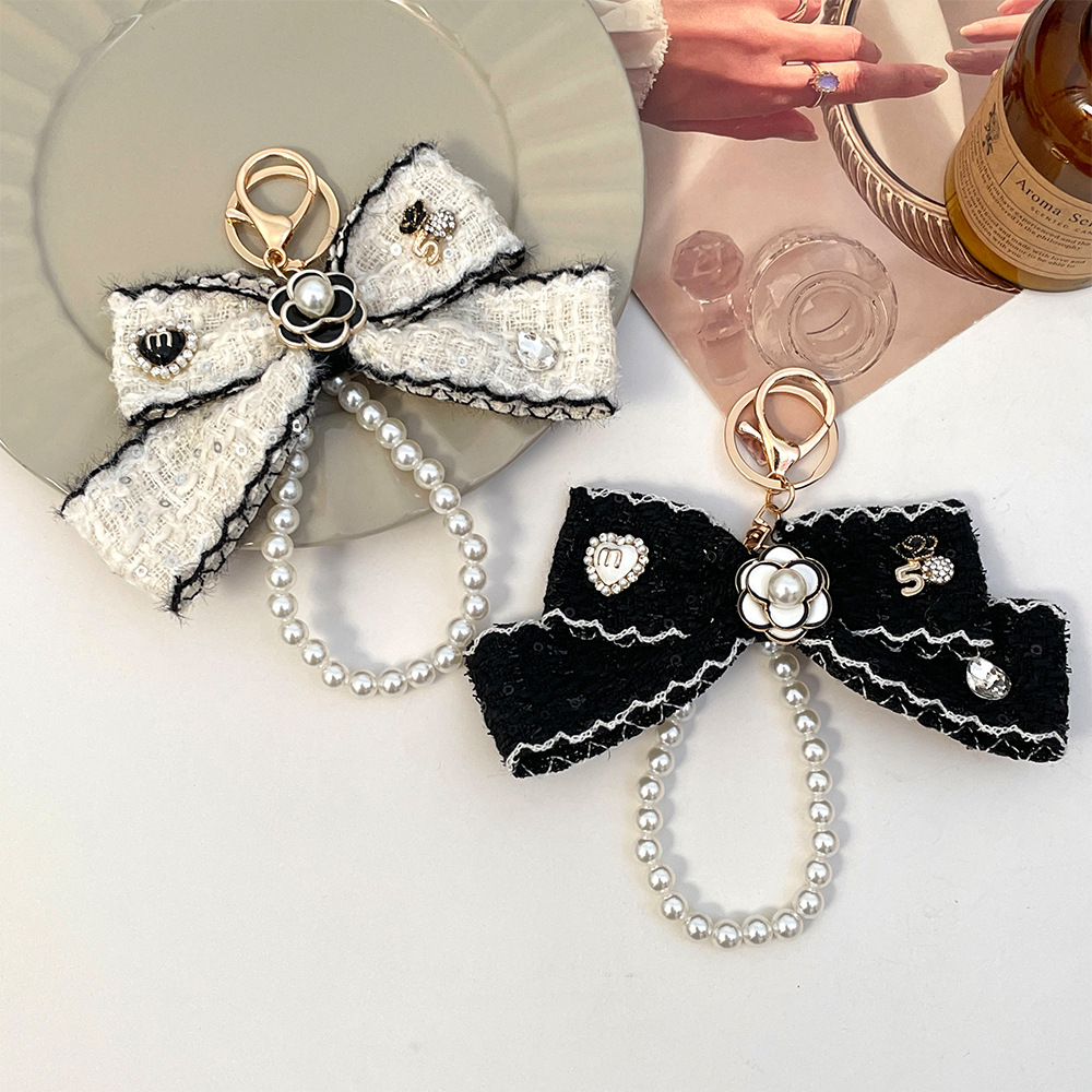 Vintage Collectible Jewelry - พวงกุญแจผ้ารูปโบว์สำหรับผู้หญิง ปี 2026 พวงกุญแจแบบสายรัด พวงกุญแจรถยนต์ จี้ห้อยกระเป๋า